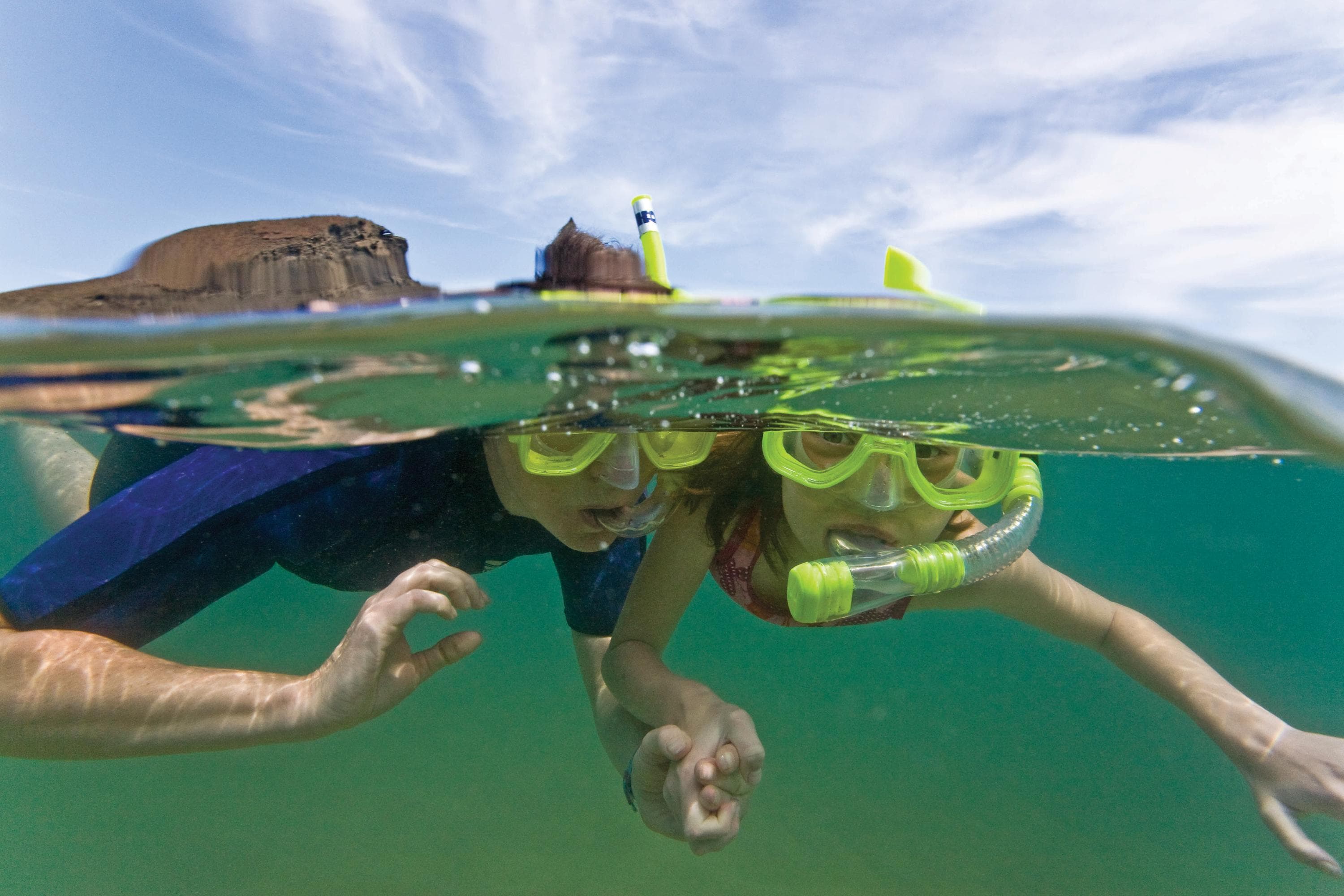 Guests snorkeling in the Galapagos Islands, Ecuador