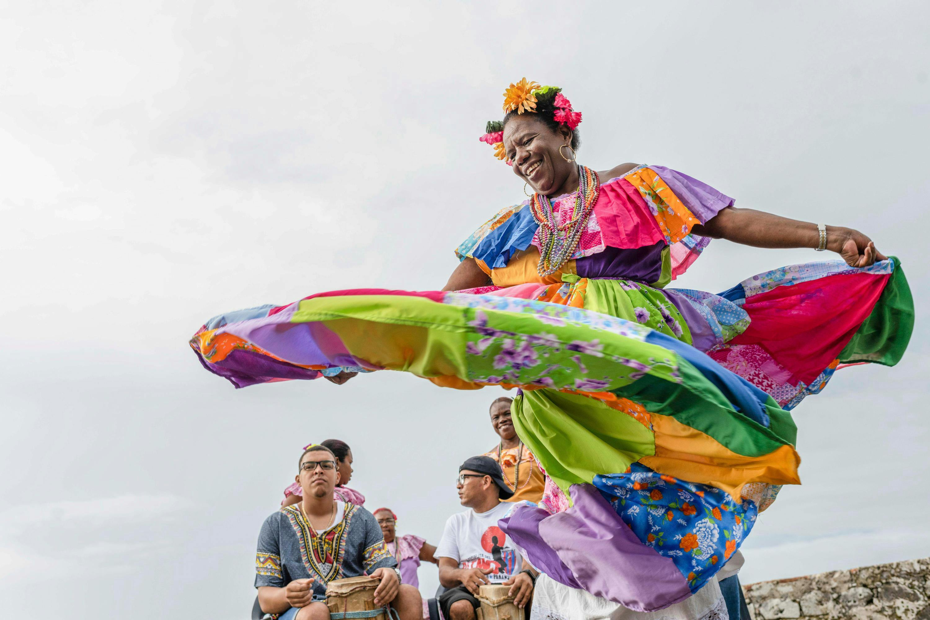 Local dancers preform the Congo Dance of Panama. The most unique and colorful manifestation of folklore in the province of Colon. The dance has its roots in Africa and came to Panama by way of escaped former slaves known as “Cimarrons.”  The dance has been passed on from generation to generation, and can be seen today in the province of Colon, in costal towns such as Portobello where the Afro-Panamanian legacy remains very much alive. Santiago Fortress, Portobelo, Colon, Panama